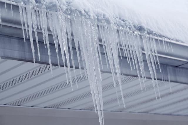 bigstock-icicles-from-gutter