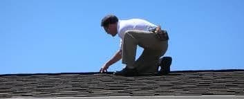 Roofer on a roof